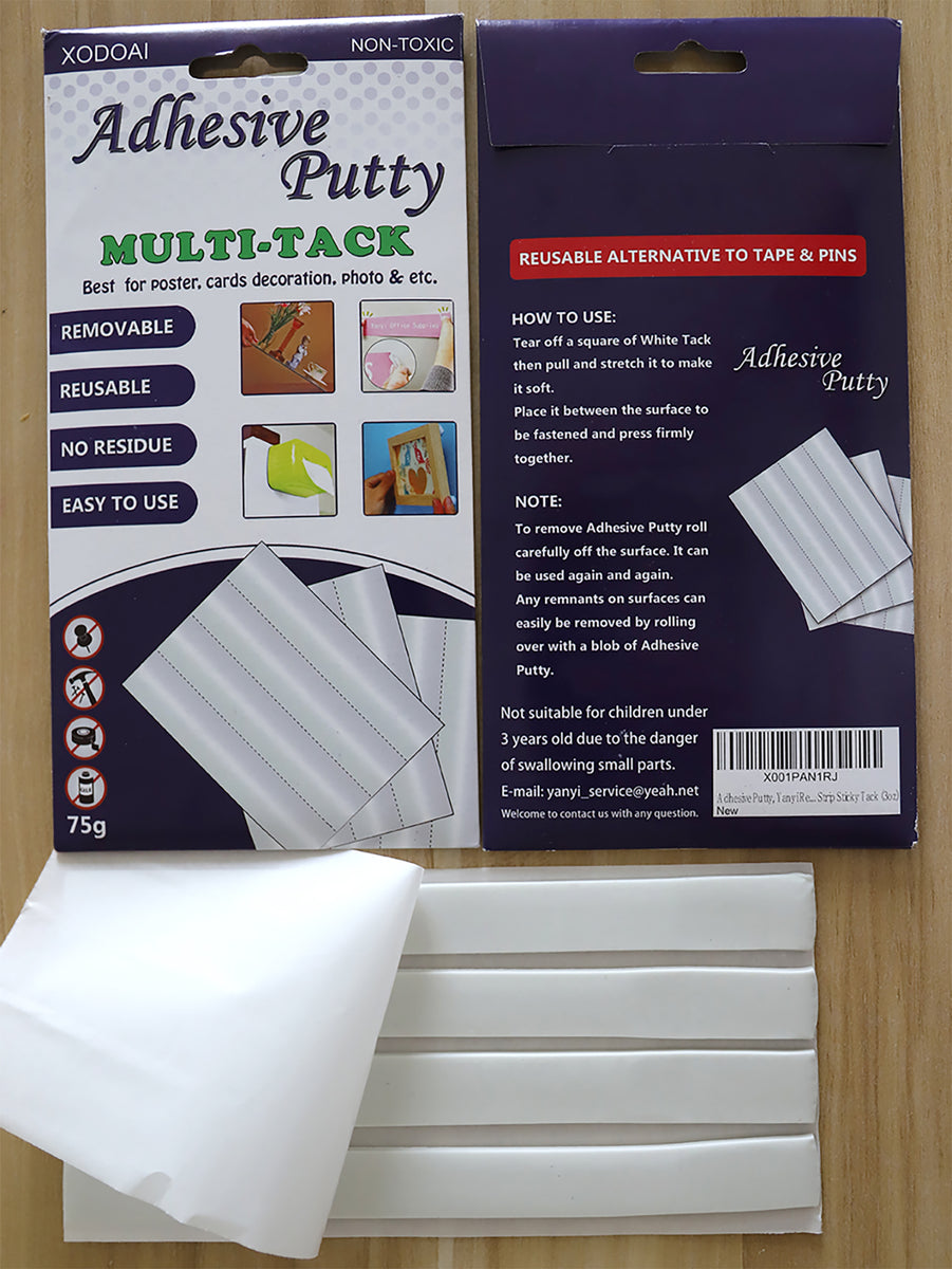 Handi Tak re Usable Adhesive Earthquake Putty Hold Poster on PopScreen